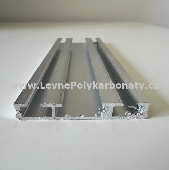 Spojovací AL-PLOCHÁ DOLNÍ krycí lišta 60/9 mm PŘÍRODNÍ - délka 6000 mm