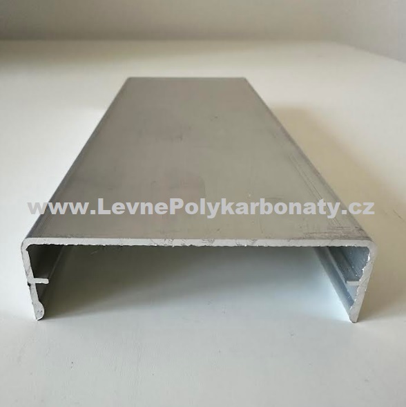 Spojovací AL-PLOCHÁ HORNÍ krycí lišta 63/20 mm ELOX STŘÍBRNÝ - délka 6000 mm