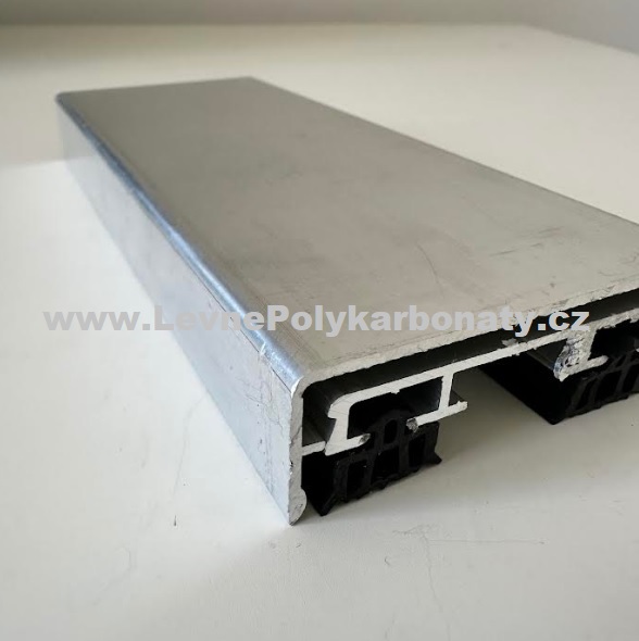 Spojovací AL-PLOCHÁ DOLNÍ krycí lišta 50/7 mm PŘÍRODNÍ - délka 6000 mm