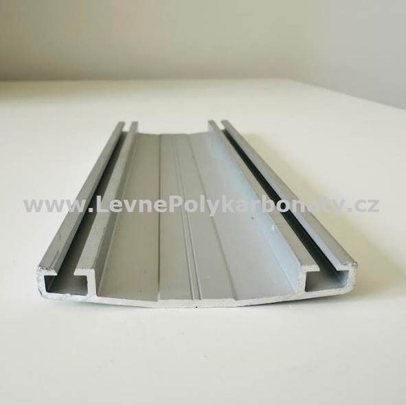 Spojovací AL-OBLÁ krycí přítlačná lišta 60/9 mm ELOX STŘÍBRNÝ - délka 3000 mm